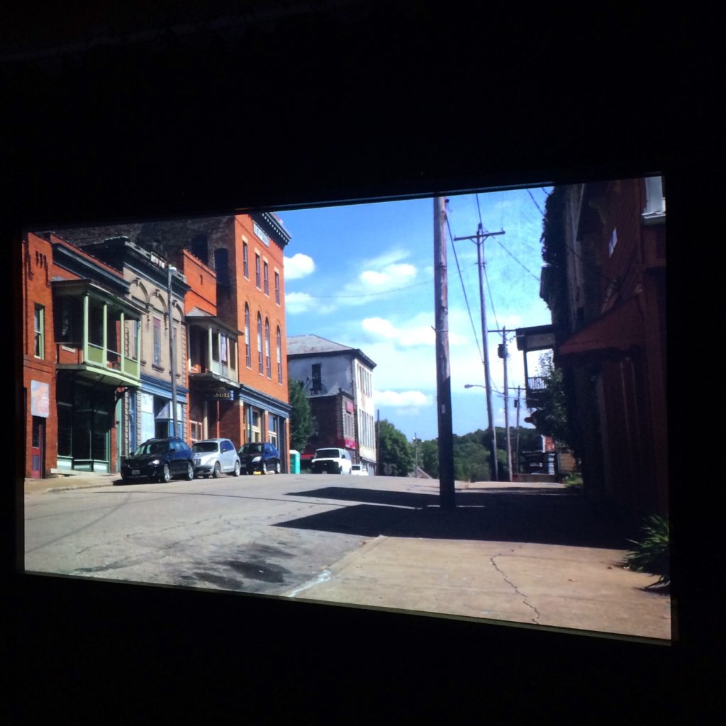 A gallery view of Shawnee Revisited, a sound and video installation exploring the past and present of energy extraction in Appalachian Ohio. At Carleton College, Northfield, Minnesota, 2018. Photo: Brian Harnetty.