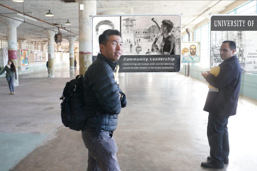  Kirn Kim and Dr. Luis Garcia stand in front of their Future IDs in a mockup design of the installation in the New Industries Building, Alcatraz. Courtesy Gregory Sale. 