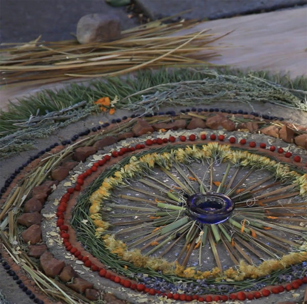 Earth mandala by cultural artist Venaya Yazzie as part of the culminating performance of SEEDS : REGENERATION, a project by ABOG Fellow Rulan Tangen and her Indigenous dance company Dancing Earth