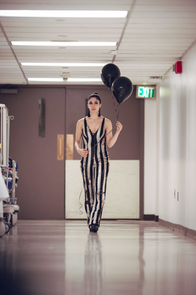 First, Do No Harm Death in the Hallway: Performer Lia Bonfilio exploring the moments before one takes their last breath and the transition after. Photo by DW Burnett.