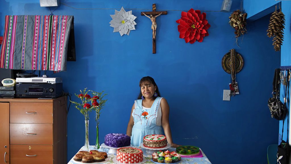 Roberta, a member of Mujeres en Movimiento, poses for a portrait during a photography workshop organized by Sol Aramendi after having realized her dream of becoming a pastry chef. Image courtesy of Sol Aramendi.